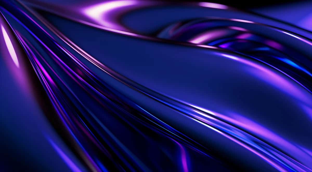 Abstract flowing light streaks in purple and blue with diagonal motion blur and depth