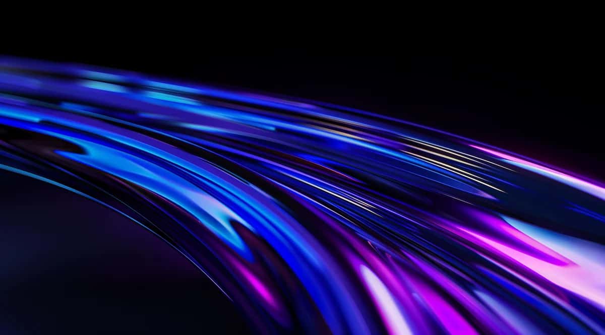 Glossy ribbons of electric blue, violet and magenta sweeping across deep black
