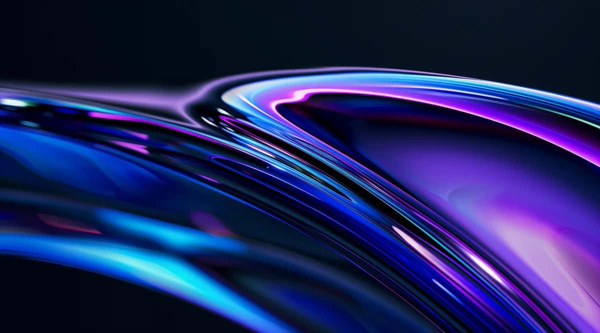 Abstract flowing glass curves in blue and purple neon light with dynamic motion blur