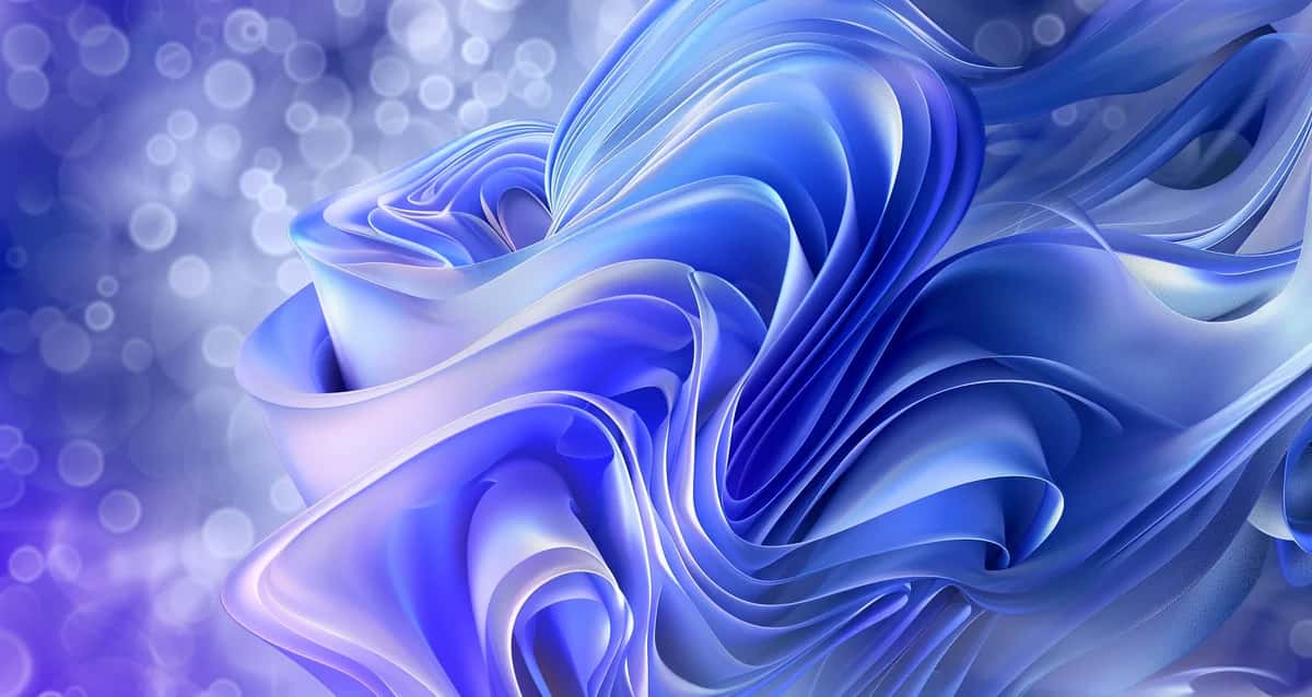 Silky blue 3D ribbon folds beside a soft lavender bokeh light field