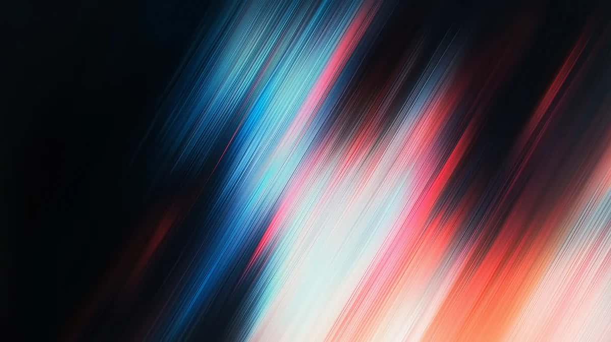 Abstract motion blur with blue, pink, and white streaks on dark background
