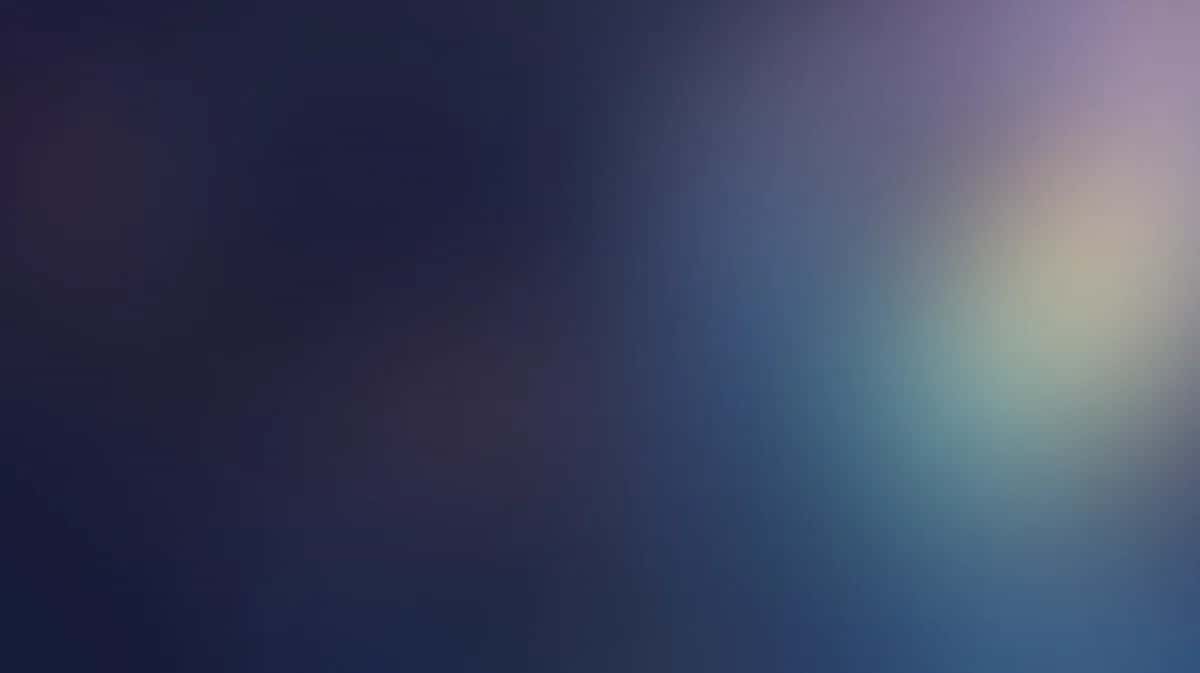 Soft gradient background transitioning from dark navy blue to teal and pale yellow light