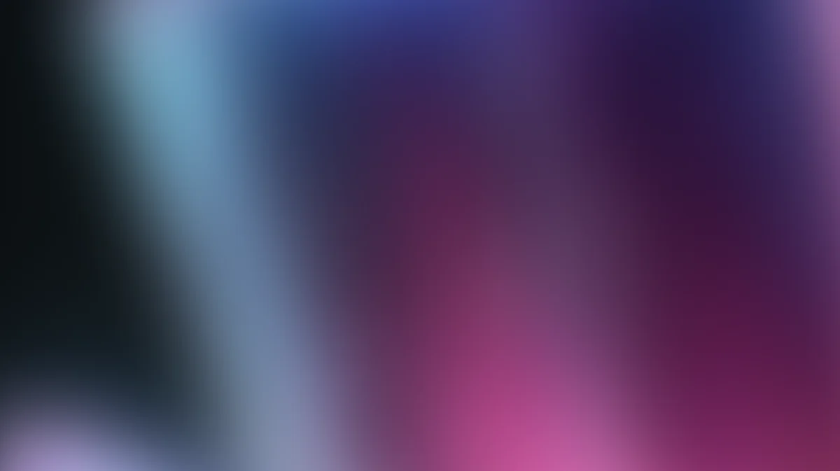 Abstract blurred gradient background transitioning from dark teal to magenta pink