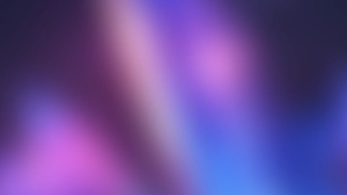 Abstract gradient background with purple, pink, and blue blurred light transitions