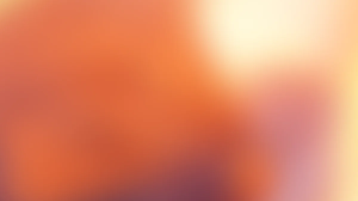 Soft gradient background transitioning from coral orange to pale pink and cream