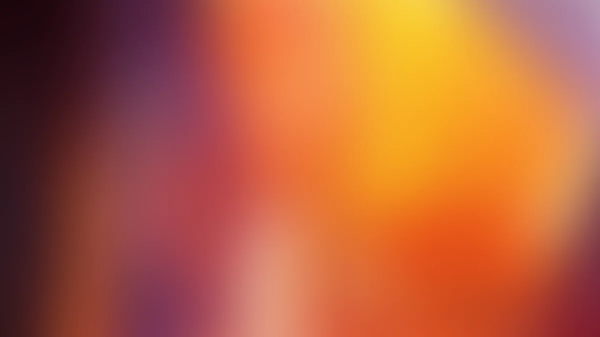 Warm gradient background transitioning from deep purple and burgundy to bright yellow and orange