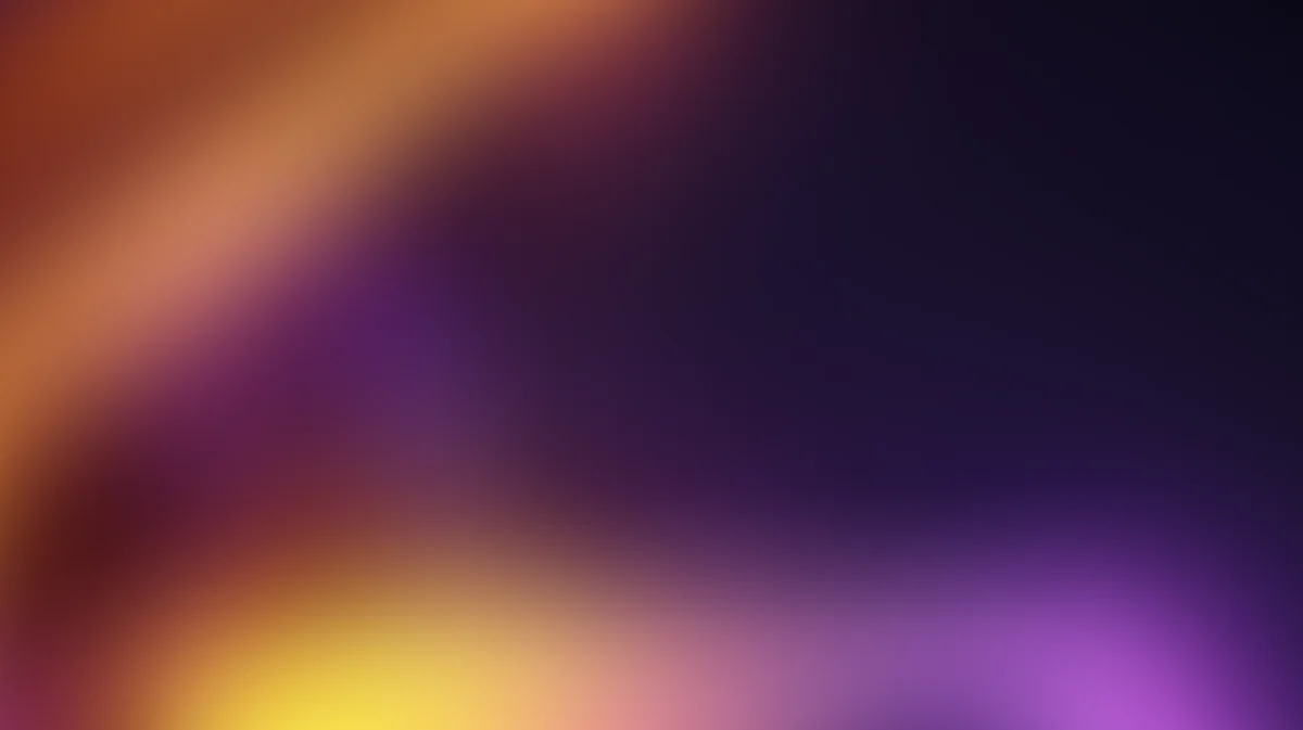 Abstract gradient background with warm orange and cool purple tones blending smoothly