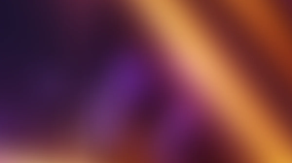 Abstract gradient background with purple, orange, and gold tones blending diagonally