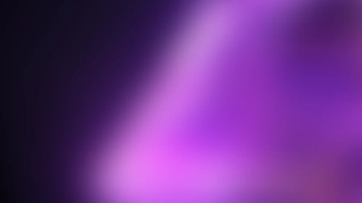 Soft purple and magenta gradient background with blurred light rays and bokeh effect