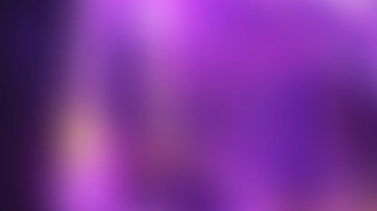 Purple and pink gradient background with soft bokeh blur effect and diffused lighting