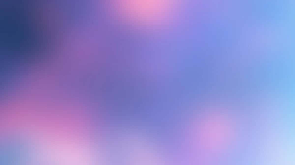 Soft blurred gradient background transitioning from pink and purple to blue tones