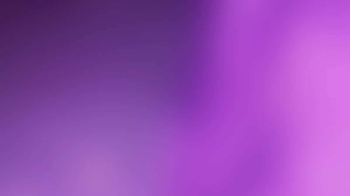Purple gradient wallpaper transitioning from deep violet to bright magenta with soft blur effect