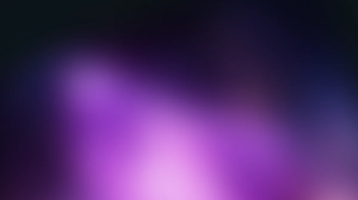 Abstract blurred gradient background with purple, magenta, and dark blue hues