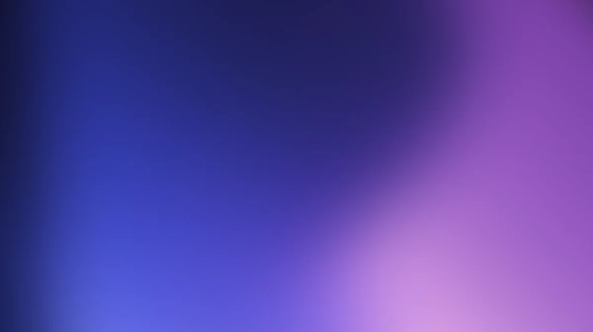 Purple and blue gradient background with soft blur, transitioning diagonally across frame