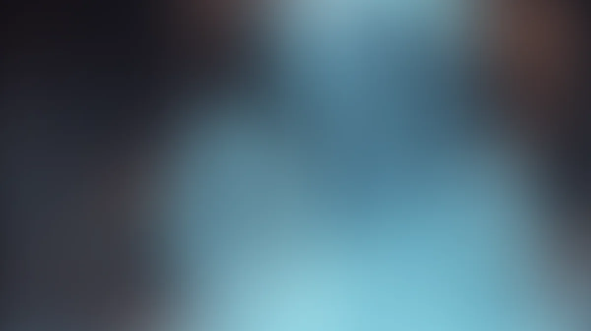 Soft blue gradient background with dark edges, blurred bokeh effect, centered light