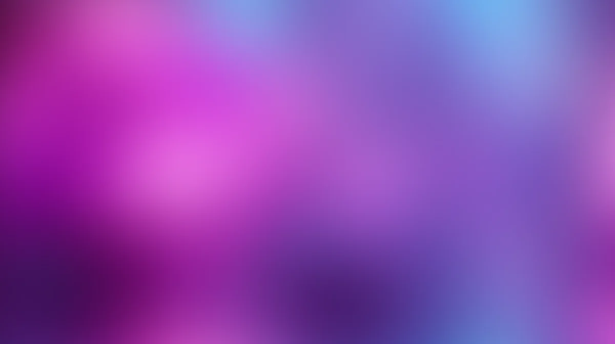 Soft blurred gradient background transitioning from magenta to purple and blue tones