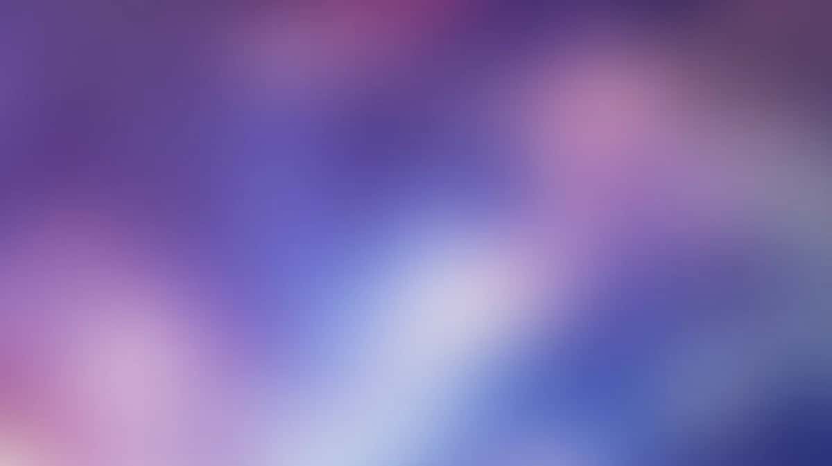 Abstract gradient background with soft purple, blue, and pink blended colors