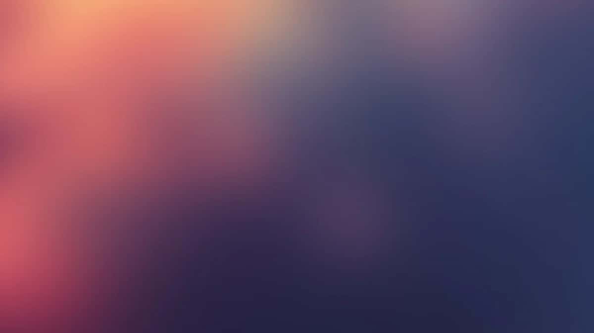 Soft gradient background transitioning from coral pink to deep navy blue
