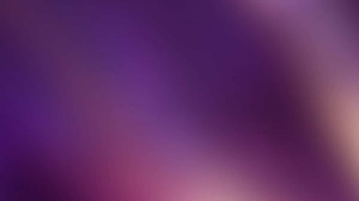 Soft purple gradient background with pink highlights and blurred light effects