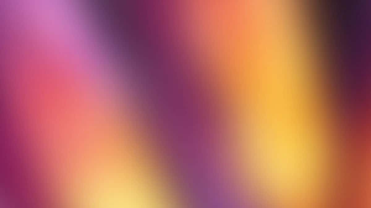 Soft gradient background with pink, purple, orange, and yellow blending seamlessly