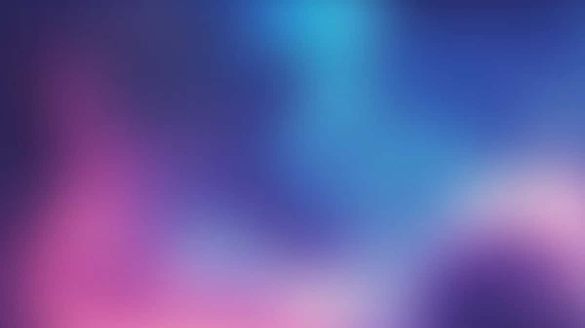 Blurred gradient background with pink, purple, and blue soft color transitions