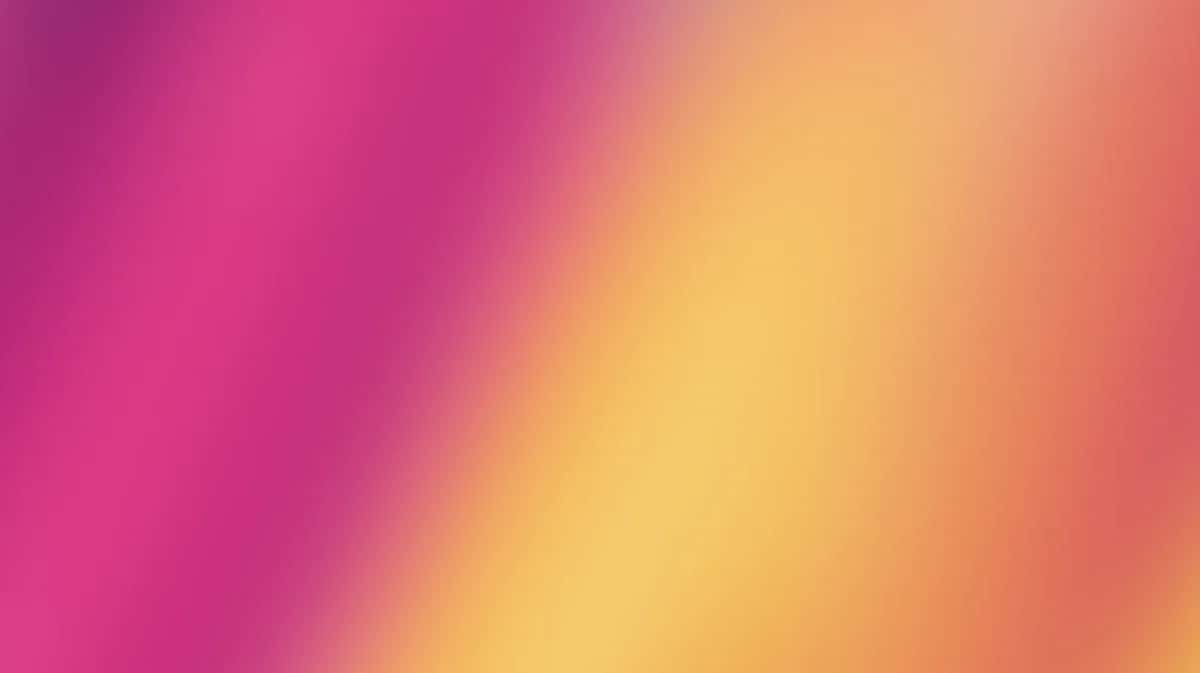 Vibrant gradient background transitioning from magenta through yellow to coral orange