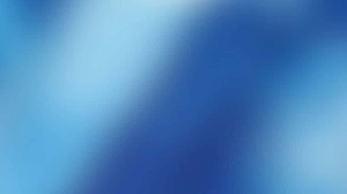 Abstract blue gradient background with soft light and dark blue diagonal blend
