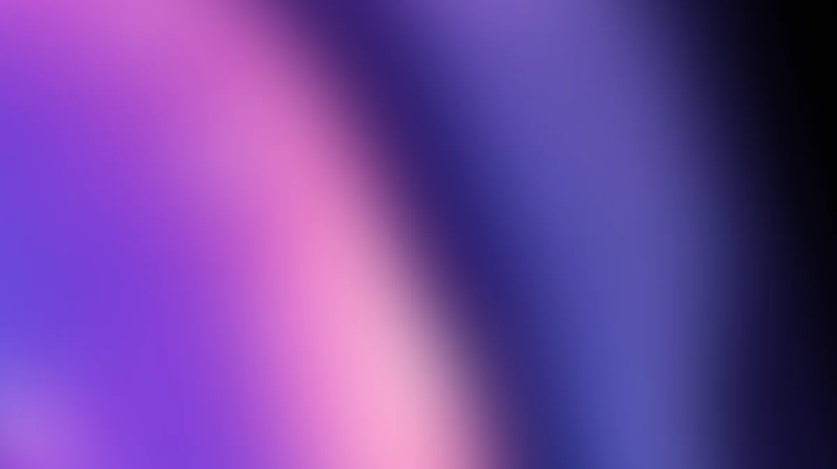 Soft gradient background blending pink, purple, and blue with blurred light rays