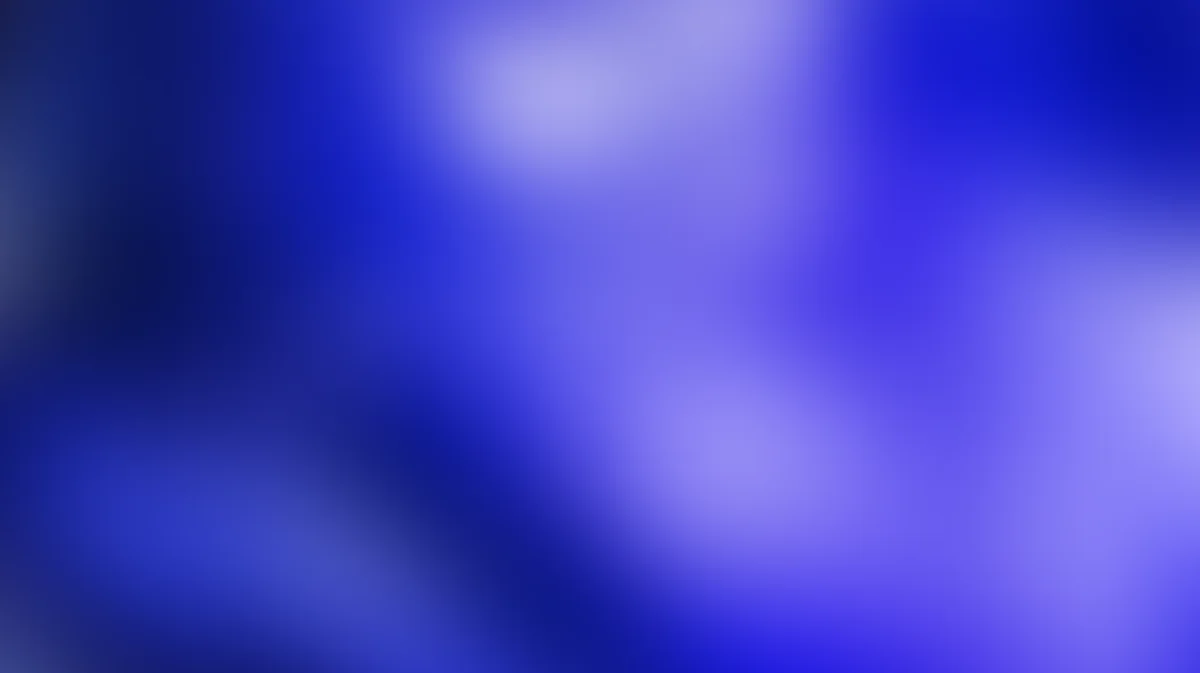 Abstract blue purple gradient background with soft blurred light and flowing shapes