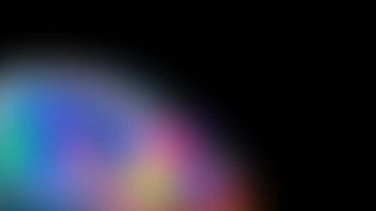 Abstract gradient background with blue, purple, pink, and yellow blended colors, soft focus blurred effect