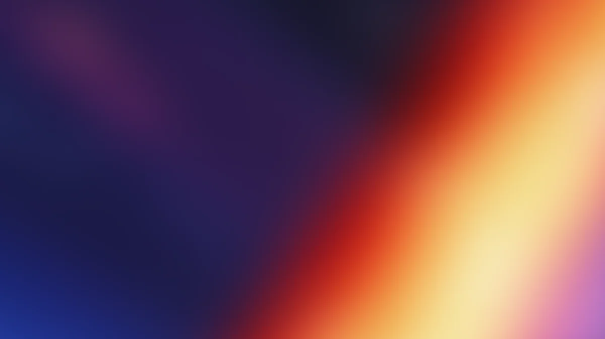 Dark indigo gradient meeting a diagonal band of crimson, amber and pale cream