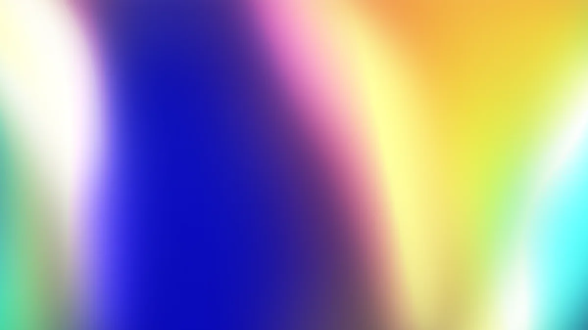 Vibrant gradient wallpaper with blue, pink, yellow, and cyan soft-focus light transitions