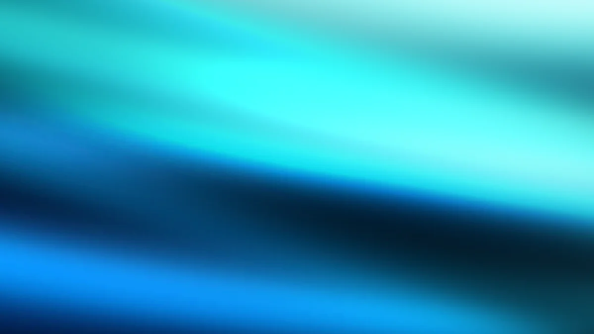 Abstract blue and turquoise gradient with soft motion blur and diagonal light streaks