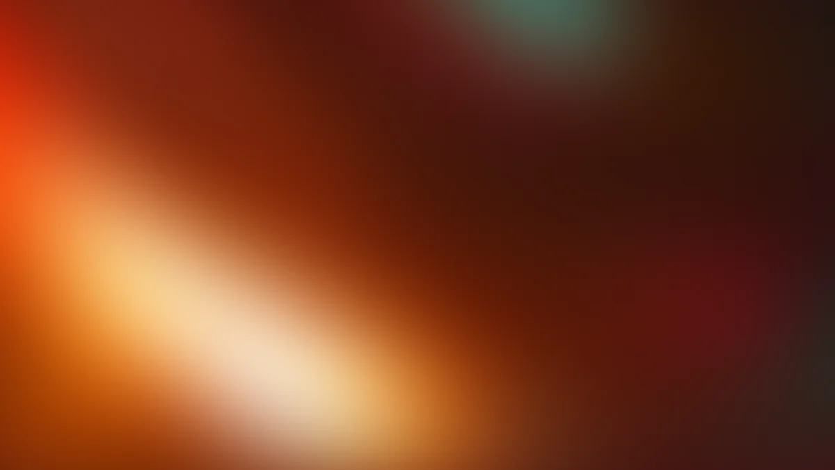 Warm gradient background transitioning from bright orange to deep burgundy with soft light rays