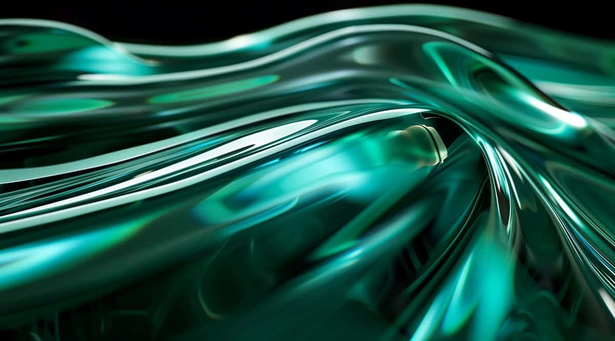 Abstract flowing glass ribbons in turquoise and teal with reflective light streaks