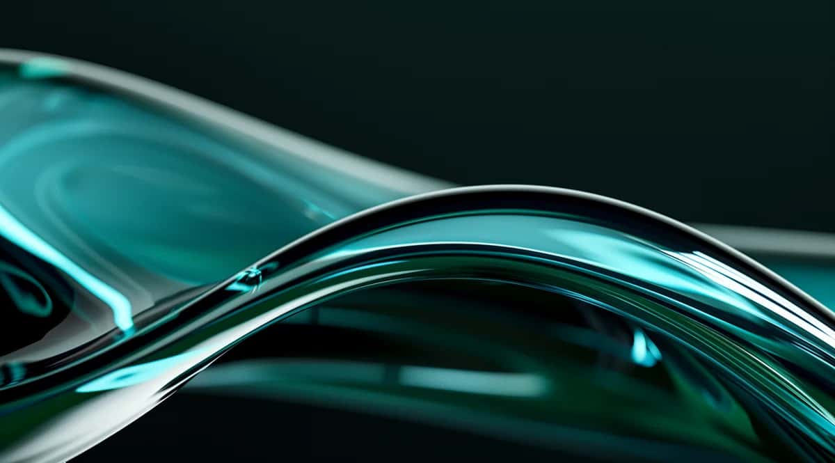 Abstract turquoise liquid wave with glossy chrome curves on dark background
