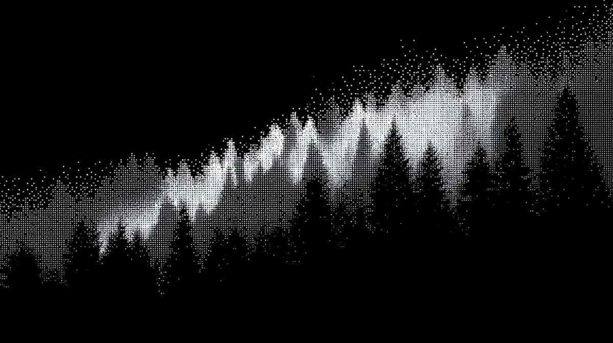Misty forest treeline in grayscale with layered silhouettes and atmospheric fog effect