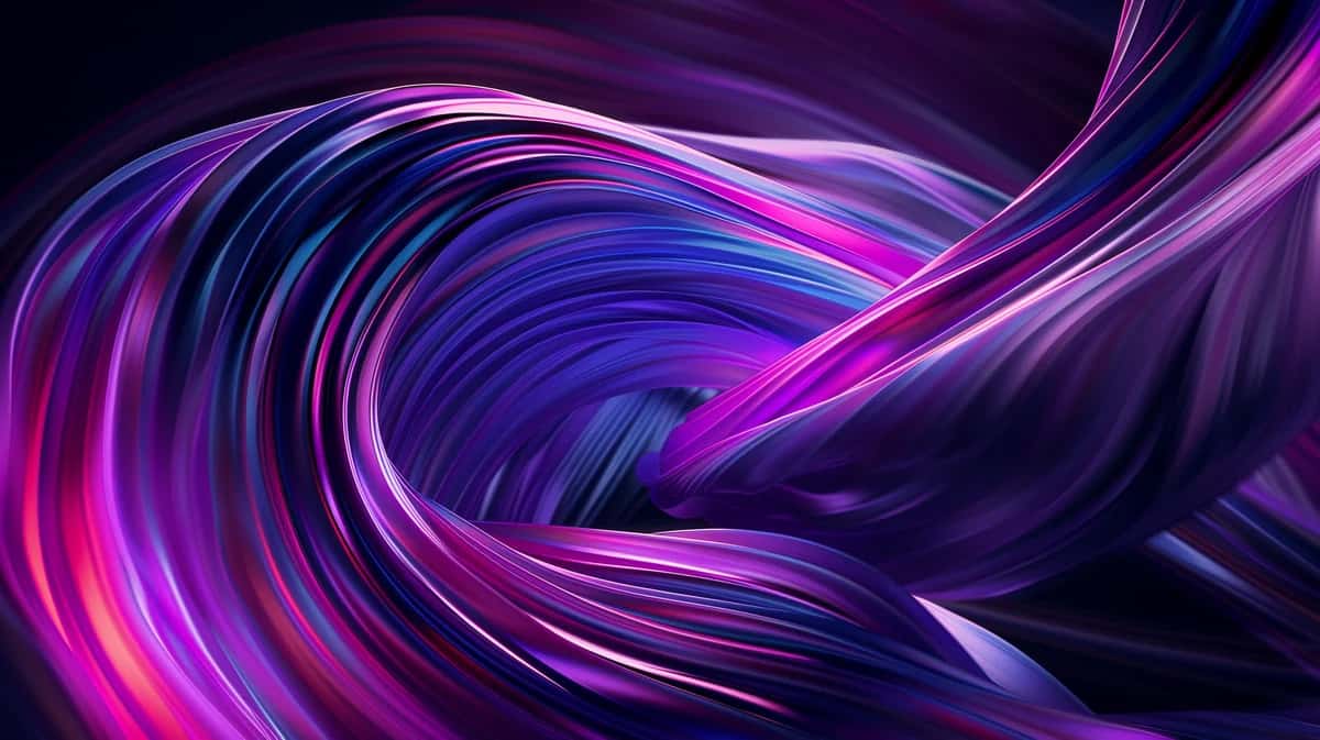 Abstract flowing ribbons in magenta, purple, and blue with dynamic curved motion on dark background