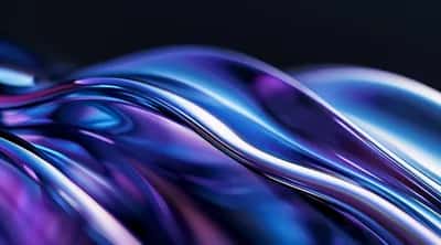 Glossy iridescent liquid waves in electric blue, violet and magenta on black