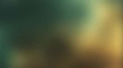 Soft blurred gradient of teal green and golden ochre with dark center