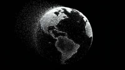 Globe of white dots showing the Americas on black, particles trailing off the left edge