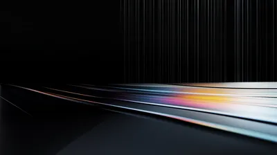 Dark floor with prismatic rainbow light streaks and thin vertical lines above