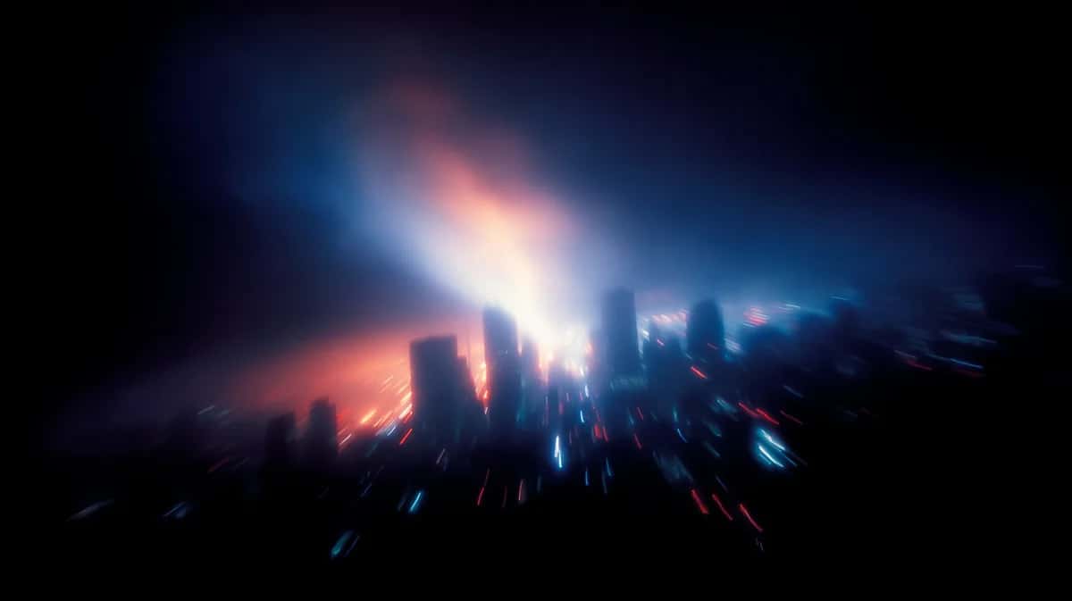 Futuristic city skyline with glowing blue and orange lights, dramatic atmospheric perspective